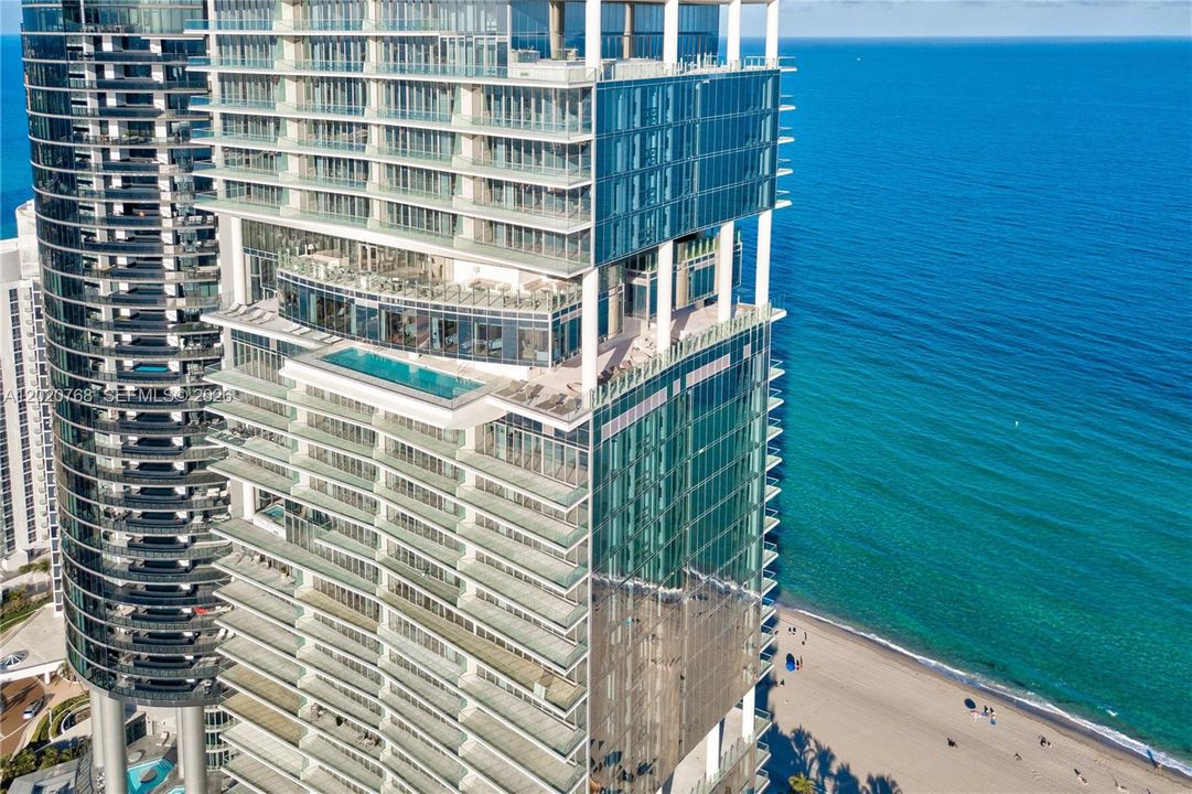 Sunrise and sunset swimming pools suspended 333’ above sea level.