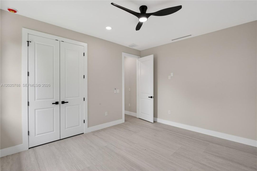 SPLIT LAYOUT offers SECOND PRIMARY SUITE w/ POOL BATHROOM & TWO GUEST BEDROOMS w/ HALL BATHROOM for added privacy.