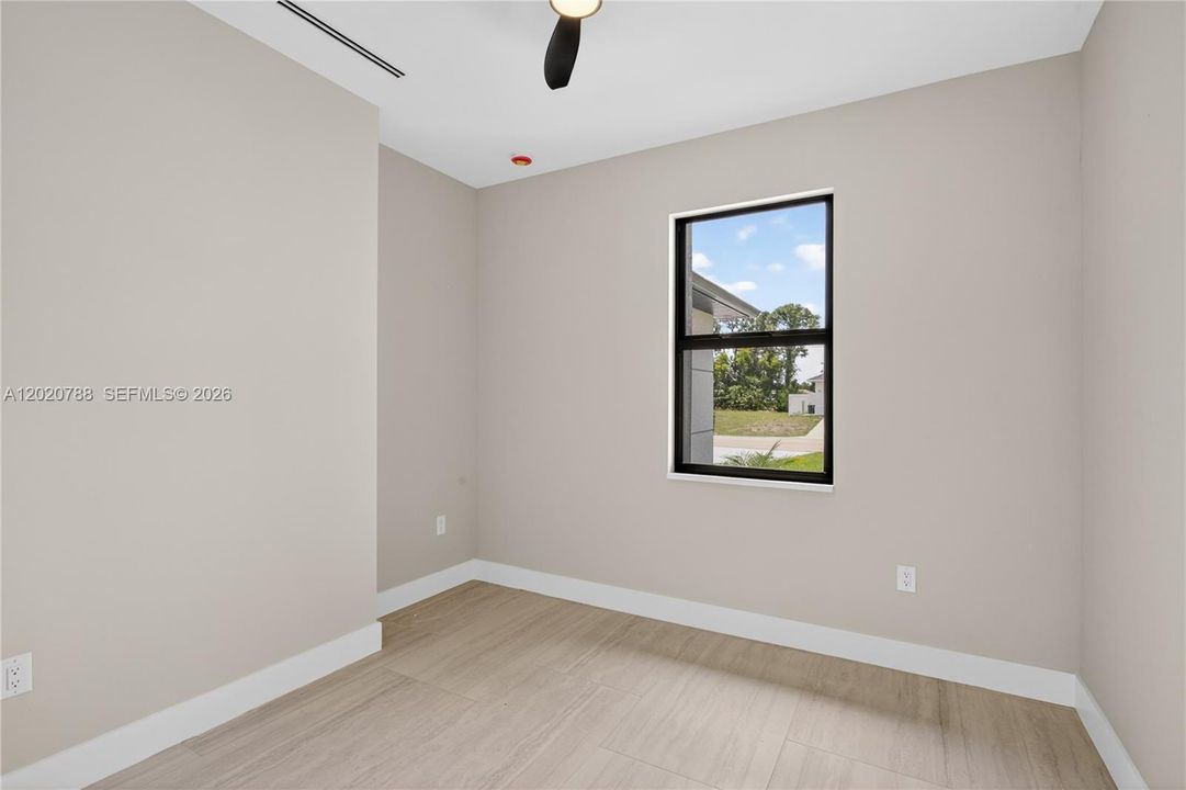 FOURTH BEDROOM offers versatile space ideal for guests, den, hobby room or additional flex living!