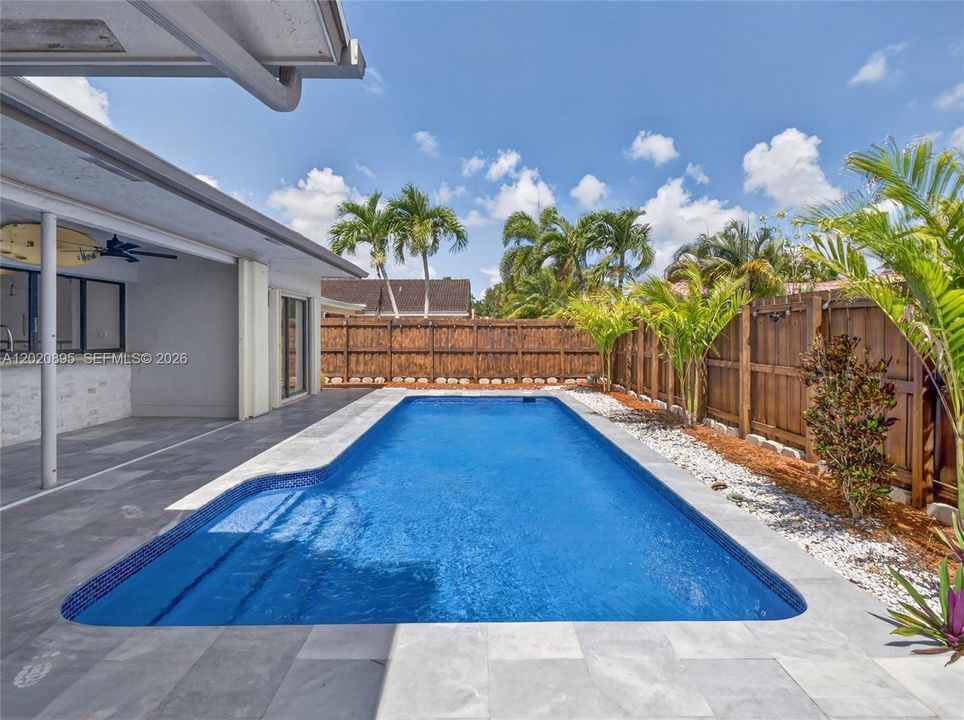 Fenced and private backyard