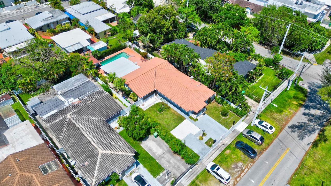 Aerial view of 3611/3613 SW 23 Street, Miami, FL 33145 - Gated duplex property 0n 9,000 sf lot, with parking inside and outside, lushly landscaped, nice yard and pool