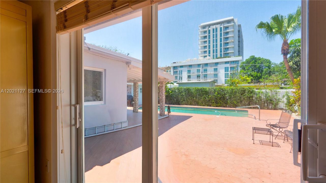 3613 - impact sliding door with view and acess to pool and patio