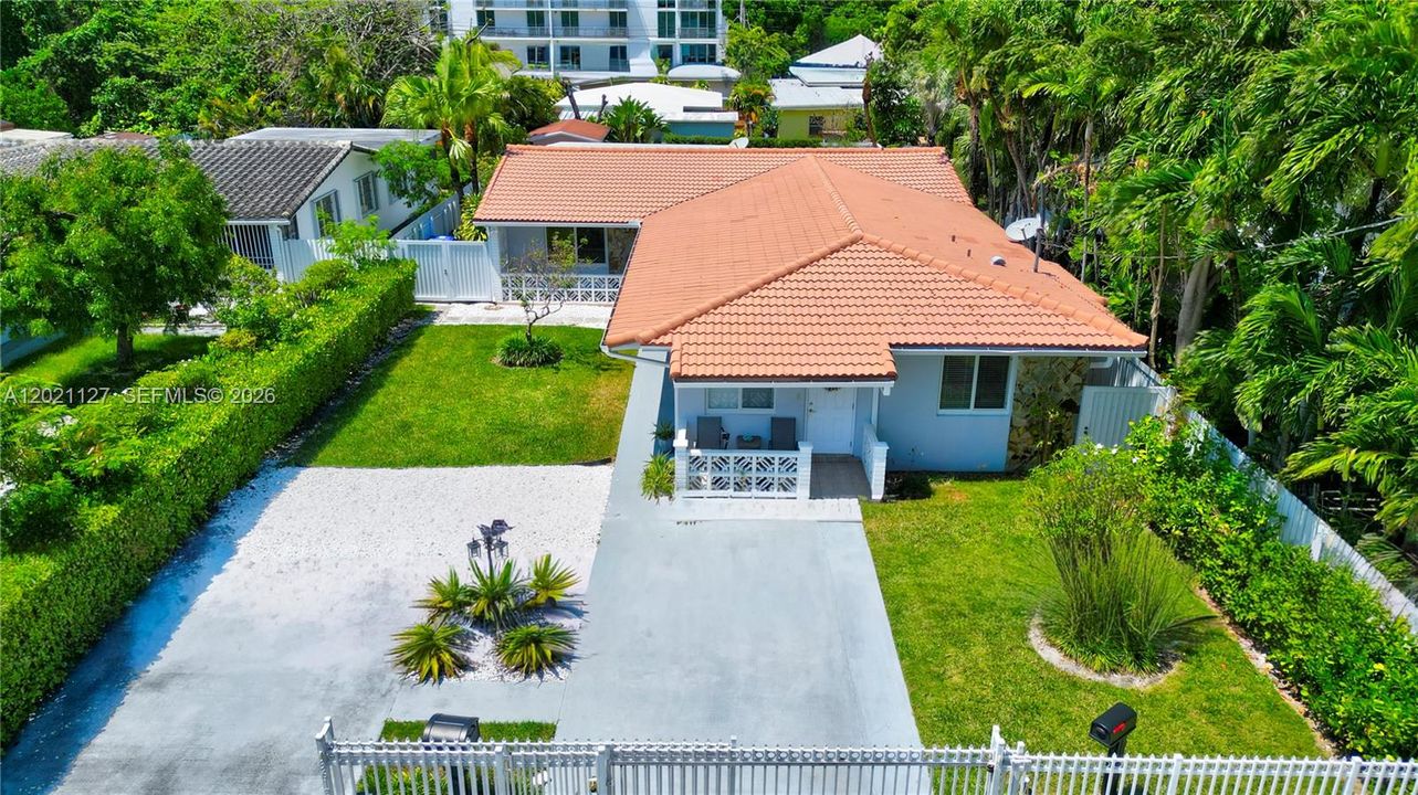 3611 & 3613 SW 23 Street, Miami, FL 33145 - Fully Gated duplex on  9,000 sf lot with parking. Front right is 3611 whcih is the 2/1 rented property. 3613 is the back 3/2 with pool and back yard