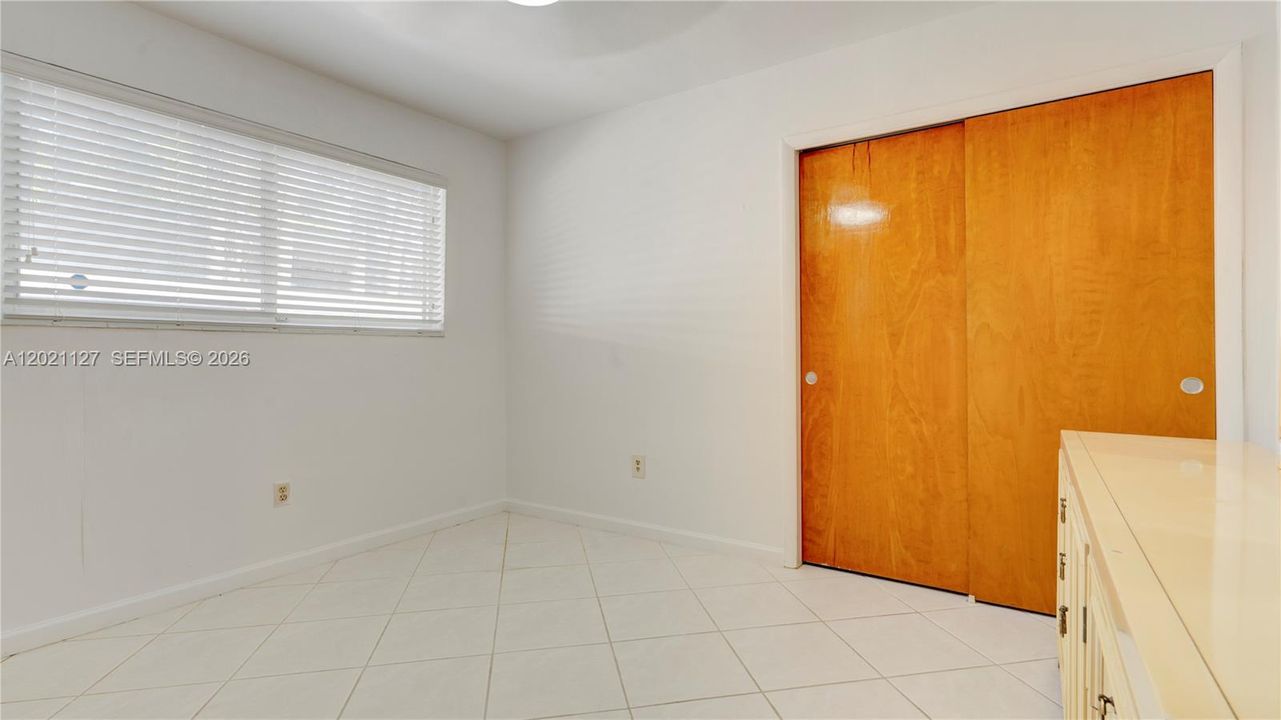 3613 - bedroom 2 with 2 closets and plenty of light