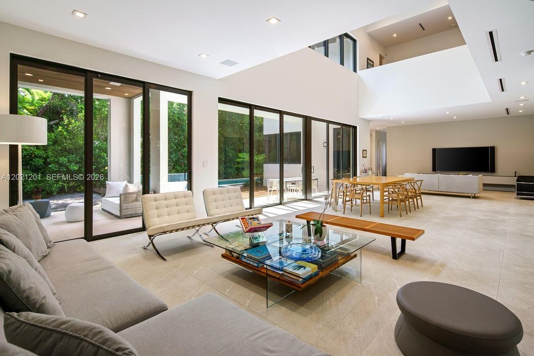 Architecturally striking great room with soaring ceilings