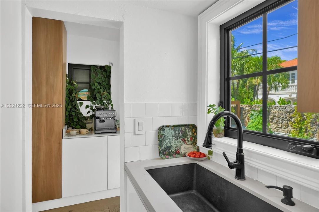Kitchen overlooking Backyard Gardens