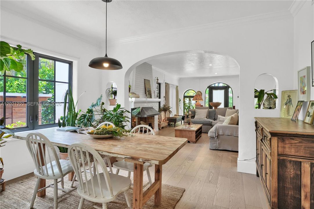 Dining Area opens to Living Room, with lots of natural light flowing through