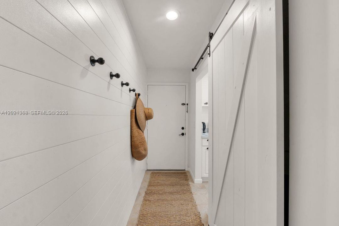Charming Barn Door and Millwork