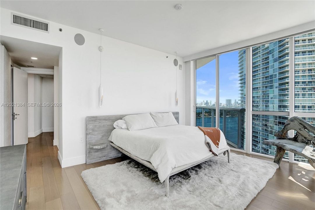 BRIGHT AND SPACIOUS MASTER BEDROOM WITH VIEWS IN EVERY DIRECTION!