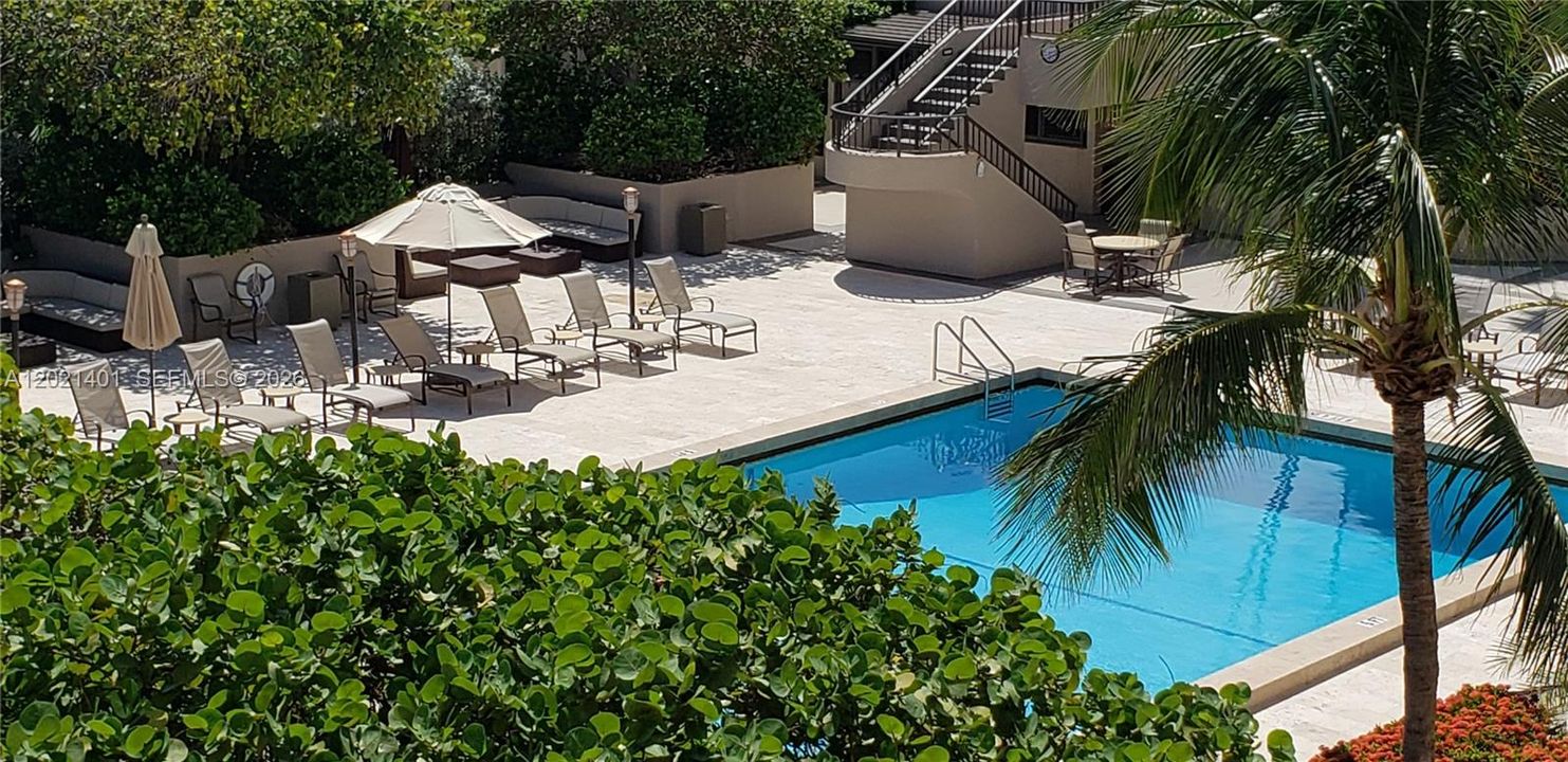 Tidemark pool dedicated to residents of the Tidemark. View to the pool from the balcony.