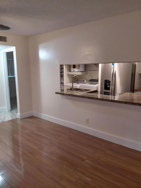 GIFFRARD VIED OF KITCHEN FROM LIVINGROOM