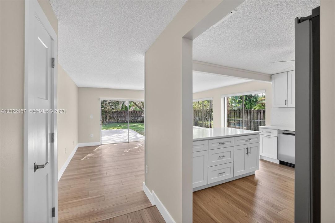one step down to the family room, pantry to the left.