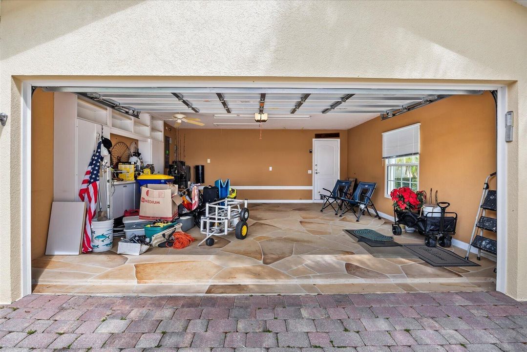 Garage with storage and stamped concrete