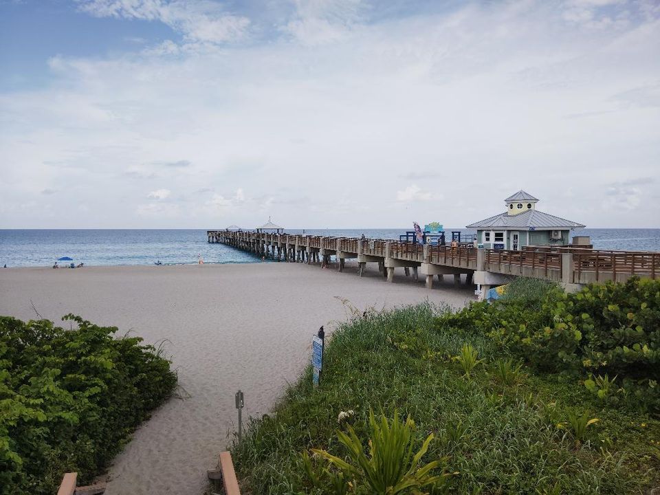 Juno Beach Pier with whate sandy beaches