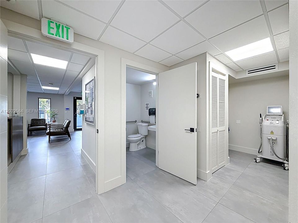 RECENTLY RENOVATED MEDICAL OFFICE BUILDING: Turnkey 3-story layout ideal for medical, wellness, or professional office use