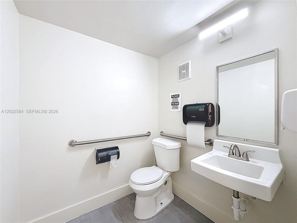 RECENTLY RENOVATED MEDICAL OFFICE BUILDING: Turnkey 3-story layout ideal for medical, wellness, or professional office use