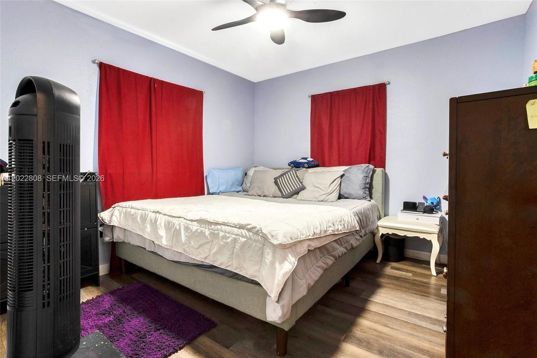 Second Bedroom. Bright and spacious bedroom featuring modern flooring, ample closet space.