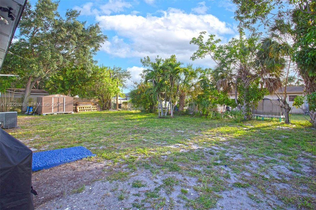 A cozy covered retreat designed for weekend barbecues, evening gatherings, and making lasting memories.