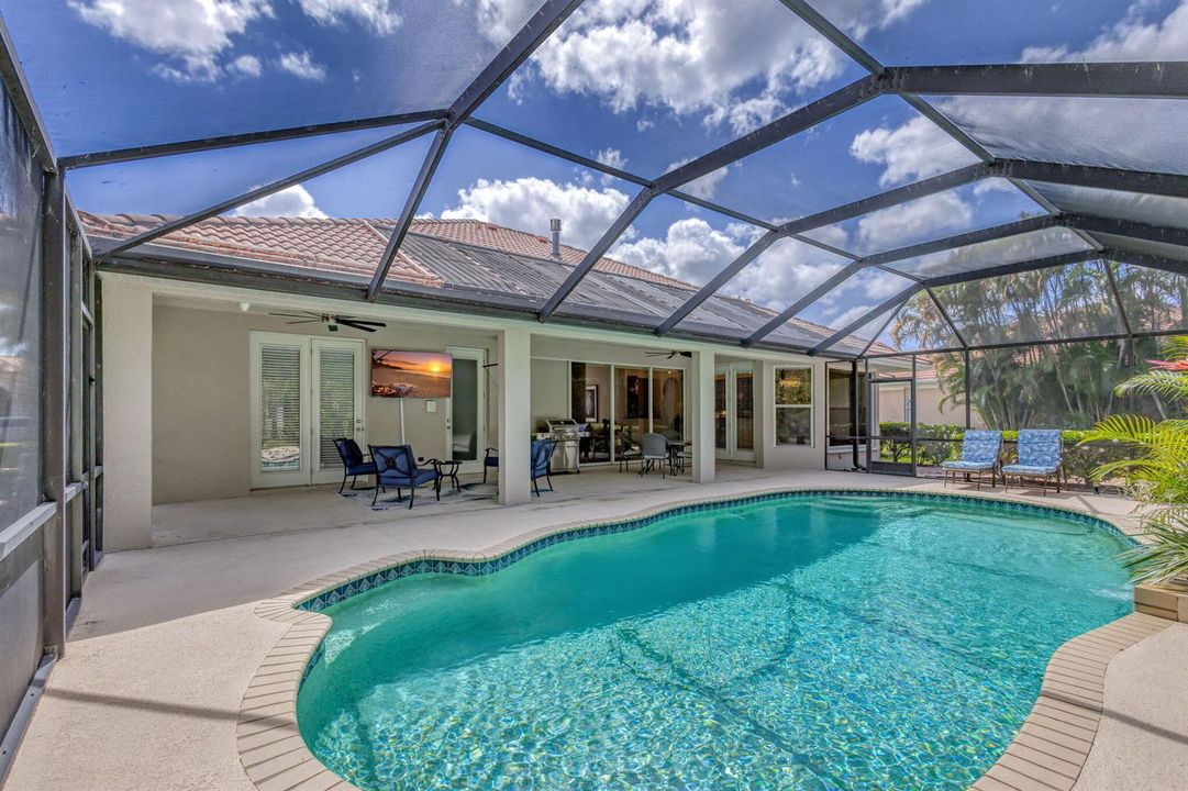 Enclosed Pool with Covered Seating Area