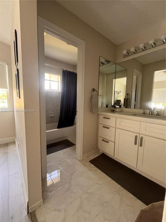 Master Bath with Seperate Privacy Area and Tub