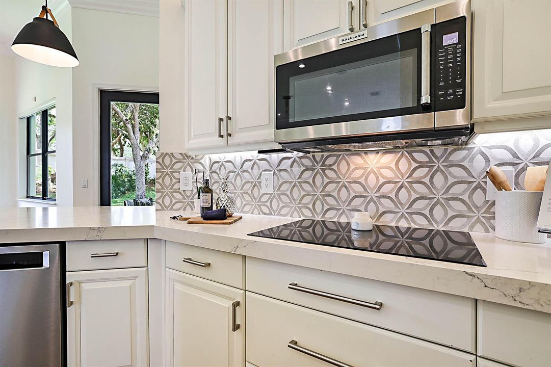 Designer tile backspalsh