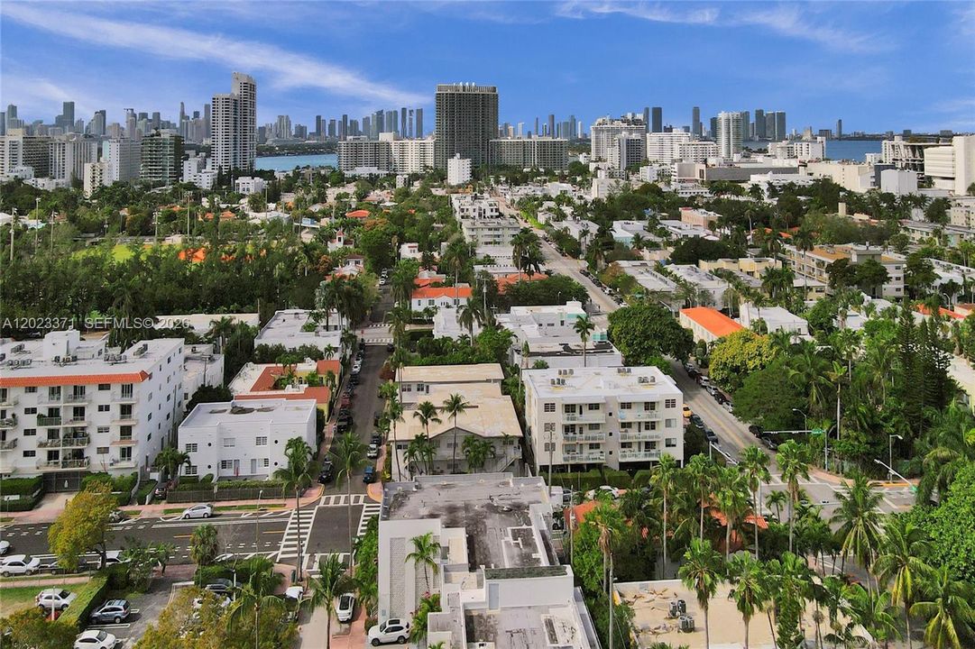 Flamingo Park to the left Biscayne Bay in the background  717 Espanola Way is the tan roof building