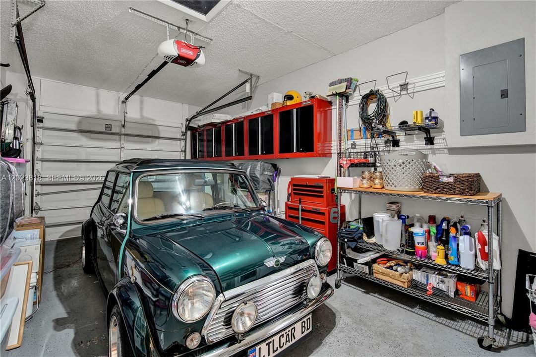 Lots of cabinets inside the garage for storage