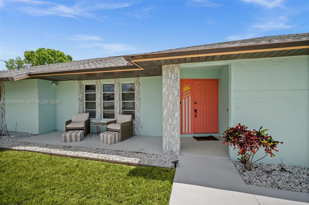 Welcoming front door and porch