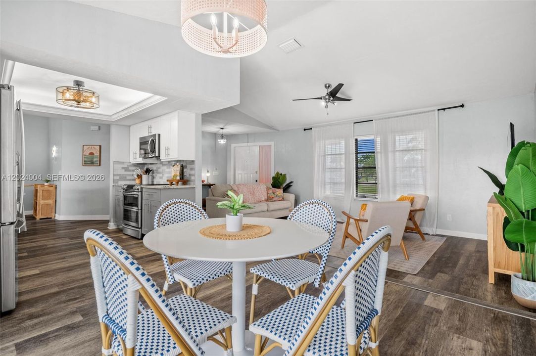 Open dining next to the kitchen