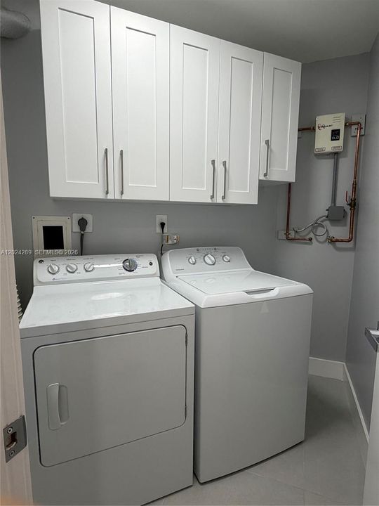 Tankless water heater, washer & dryer, and lots of storage