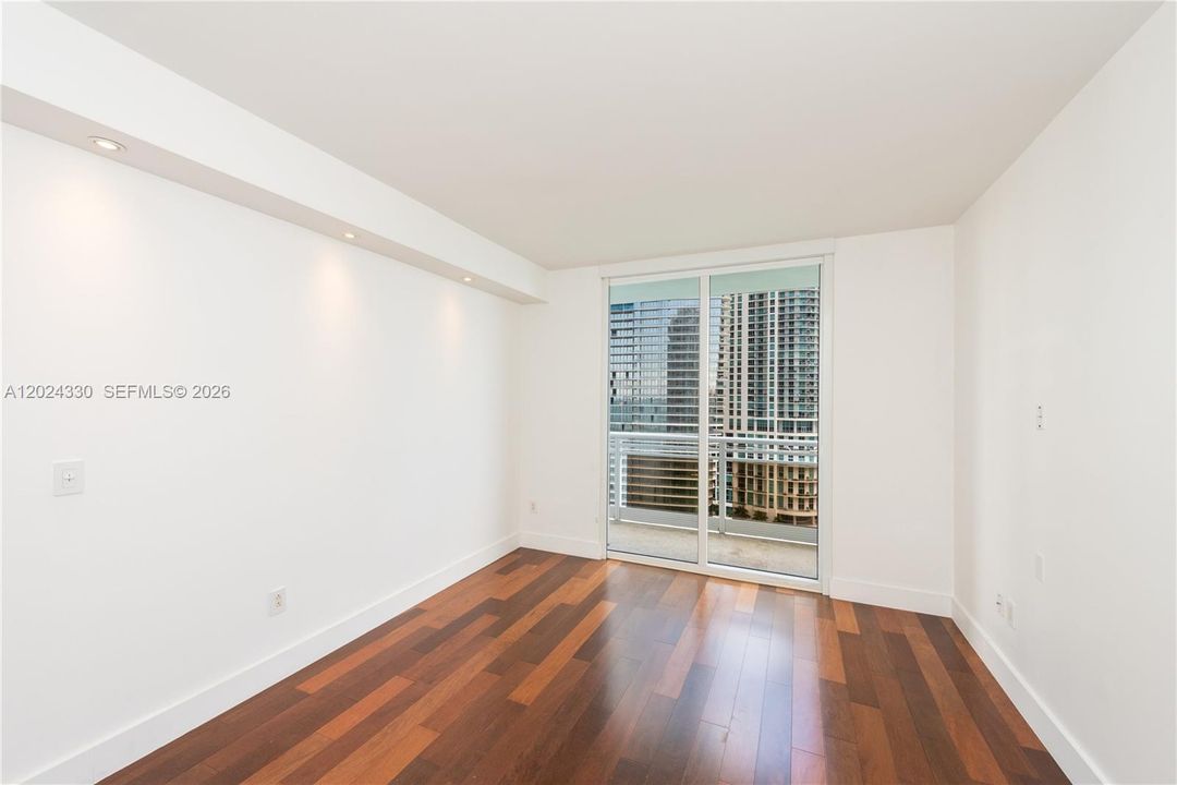 Bedroom 3 -Wood Floors - Recessed Lighting - Sliding Door