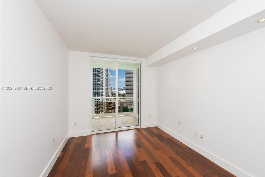 Bedroom 2 - Wood Floors - Recessed Lighting - Sliding Door