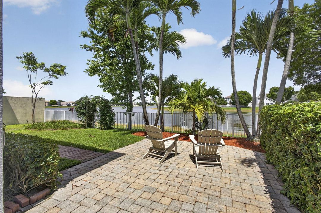 Fenced backyard with lake views