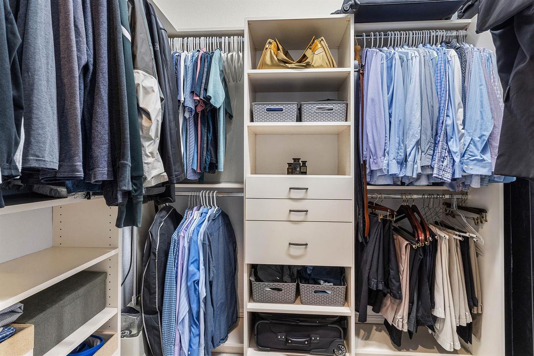 Two Primary Walk-In Outfitted Closets