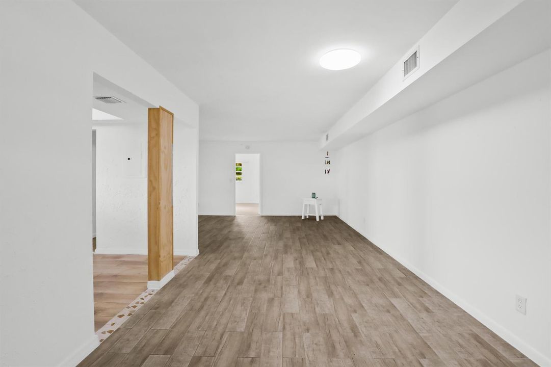 New wood-look tile flooring throughout