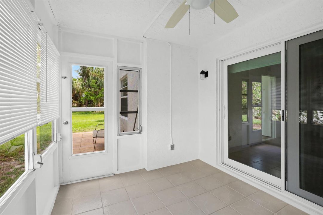 ENCLOSED PORCH-NEW SLIDING DOOR