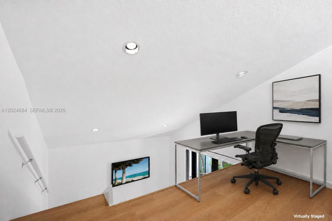 Loft is the perfect space for a home office. Plenty of space for large L-Shaped desk, filing cabinet(s), and bookshelf