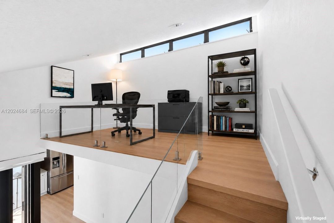 Loft is the perfect space for a home office. Plenty of space for large L-Shaped desk, filing cabinet(s), and bookshelf