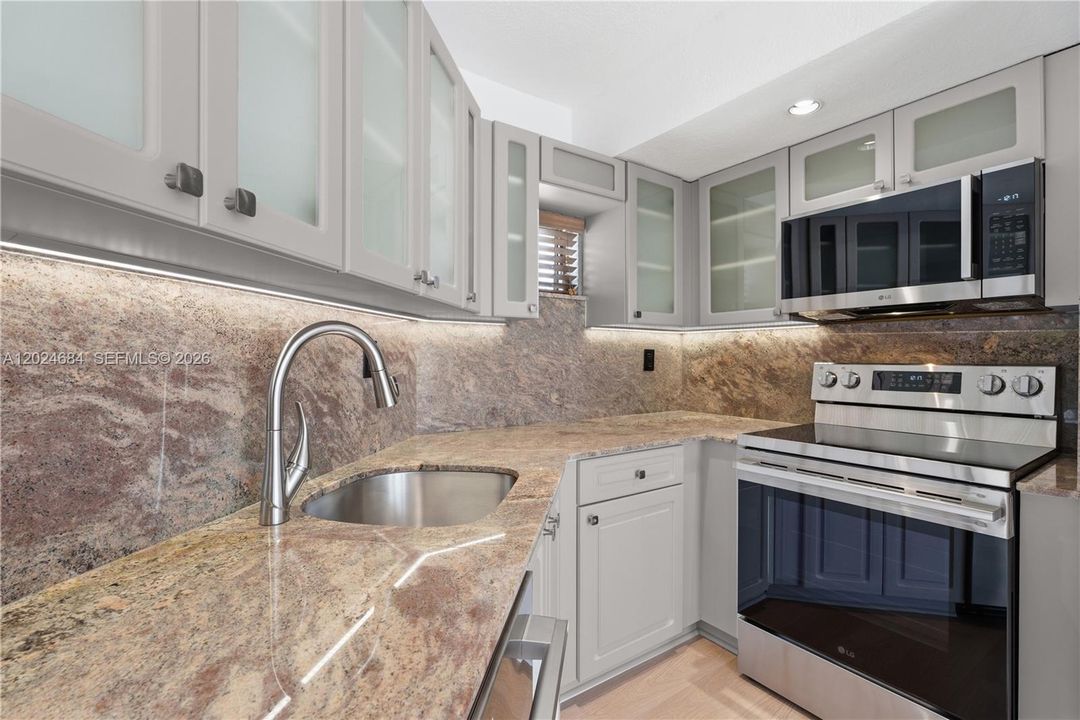 New oven, microwave & dishwasher.