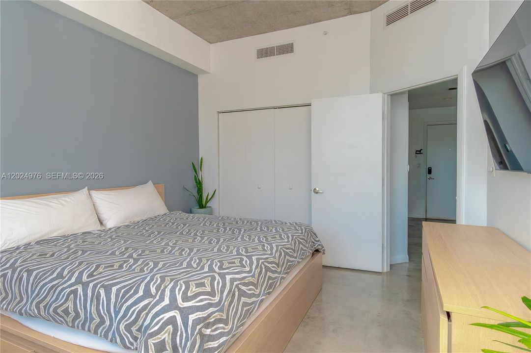 Spacious Primary Bedroom w/ King Size Bed and Smart TV