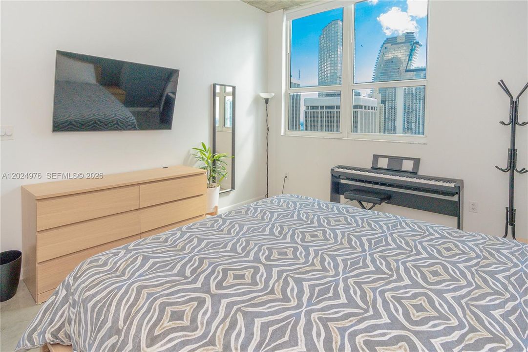 Spacious Primary Bedroom w/ King Size Bed and Smart TV
