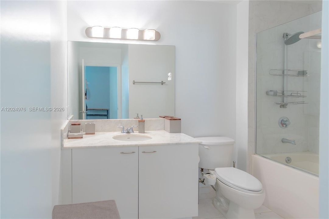 Primary Bathroom w/ Marble Countertops and Custom Tile + Glass Shower (You won't find this in other units)