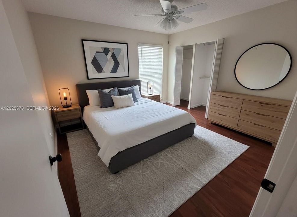 second bedroom staged with AI for decorative purposes