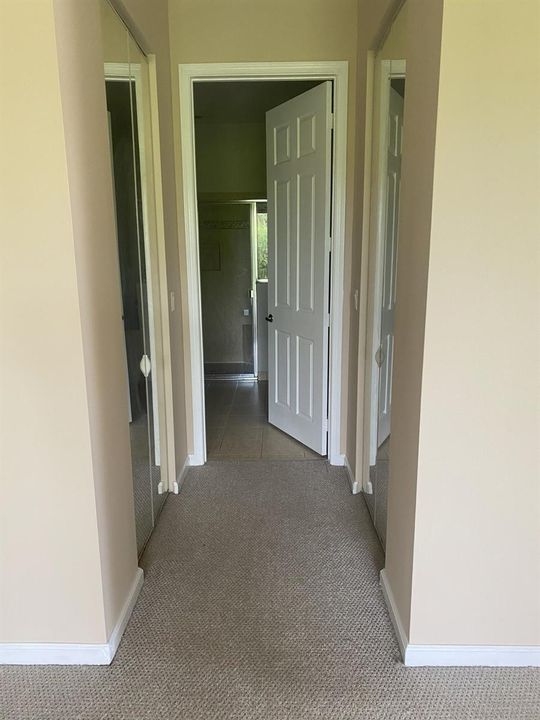 to Primary Bath & Closet