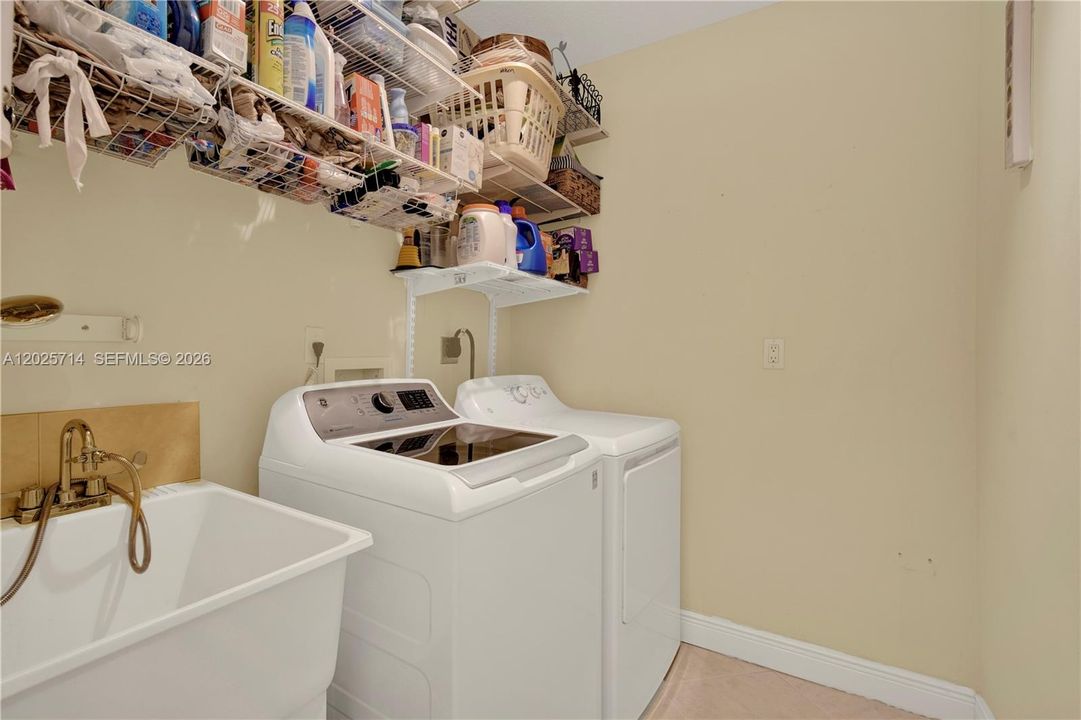 Spacious laundry room inside the main house