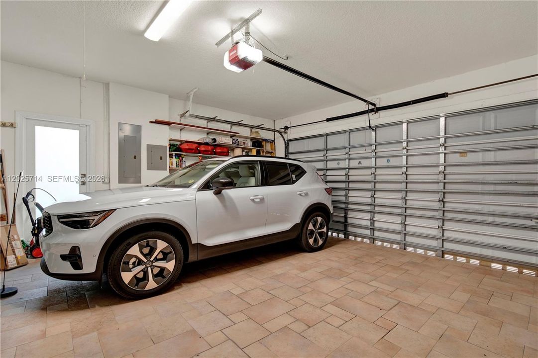 Double car garage with door to the yard.