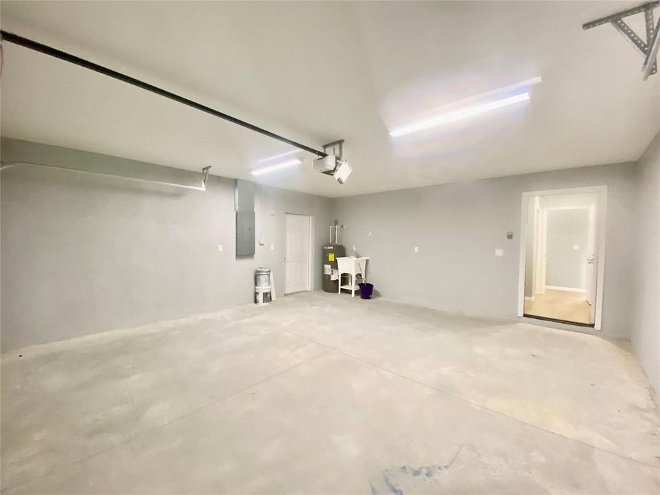 garage with side service garage door