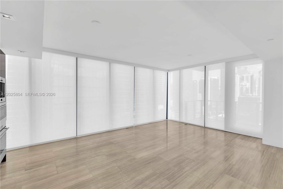 Living room with remote control blinders closed.