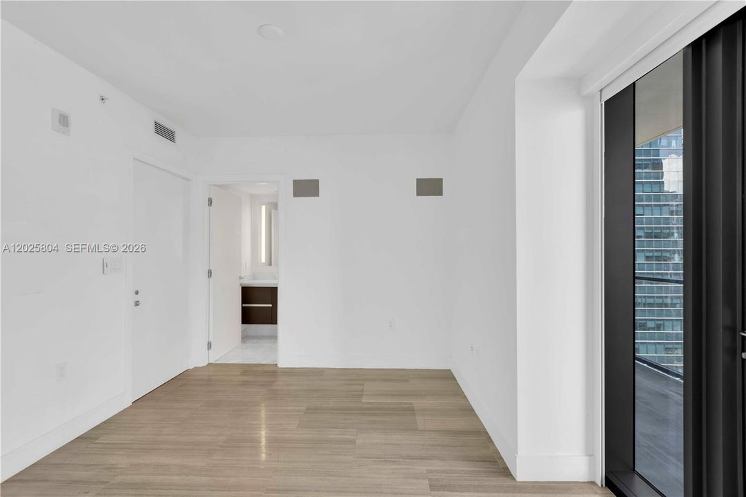 Master bedroom with exit to the balcony.