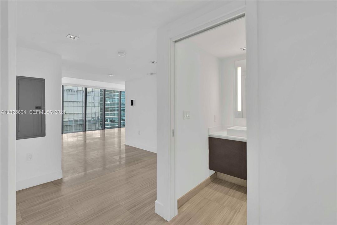 Main entrance, half bath and living room entrance.
